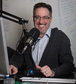 Joe smiling during a podcast