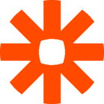An orange, eight-pointed starburst shape with a square center on a transparent background evokes the innovative spirit of automation tools, seamlessly integrating form and function.